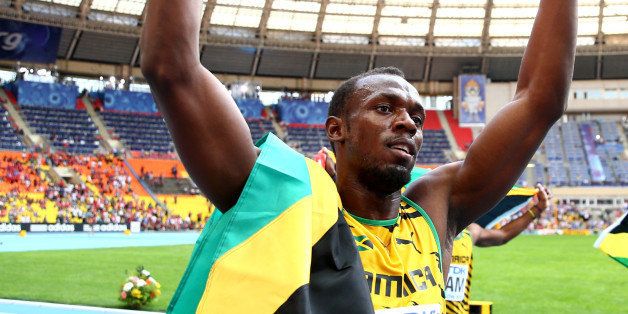 MOSCOW, RUSSIA - AUGUST 18: Usain Bolt of Jamaica celebrates winning gold in the Men's 4x100 metres final during Day Nine of the 14th IAAF World Athletics Championships Moscow 2013 at Luzhniki Stadium on August 18, 2013 in Moscow, Russia. (Photo by Paul Gilham/Getty Images)