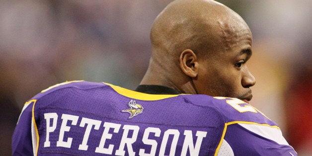 MINNEAPOLIS, MN - DECEMBER 30: Adrian Peterson #28 of the Minnesota Vikings after a game against Green Bay Packers on December 30, 2012 at Mall of America Field at the Hubert H. Humphrey Metrodome in Minneapolis, Minnesota. The Vikings defeated the Packers 37-34. (Photo by Andy Clayton King/Getty Images)