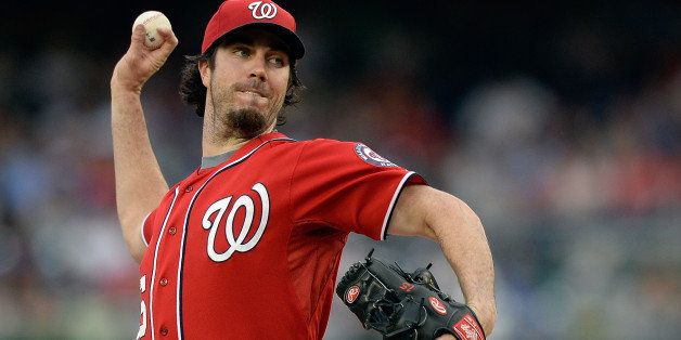 WASHINGTON, DC - JULY 27: Starting pitcher Dan Haren #15 of the Washington Nationals throws a pitch during a game against the New York Mets at Nationals Park on July 27, 2013 in Washington, DC. (Photo by Patrick McDermott/Getty Images)