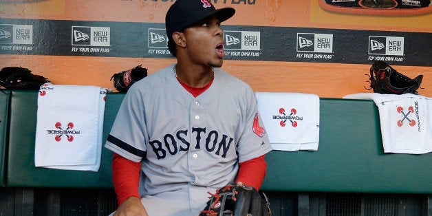 SAN FRANCISCO, CA - AUGUST 20: Xander Bogaerts #72 of the Boston Red Sox looks on from the dugout prior to the start of his