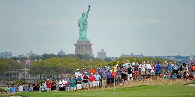 JERSEY CITY, NJ - AUGUST 23: Fans watch the action on the second hole during the second round of The Barclays at Liberty National Golf Club on August 23, 2013 in Jersey City, New Jersey. (Photo by Chris Condon/PGA TOUR)