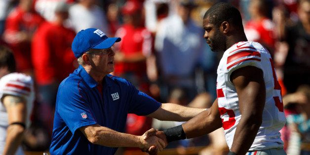 SAN FRANCISCO, CA - OCTOBER 14: Head coach Tom Coughlin of the New York Giants shakes hands with Keith Rivers #55 before the game against the San Francisco 49ers at Candlestick Park on October 14, 2012 in San Francisco, California. The New York Giants defeated the San Francisco 49ers 26-3. Photo by Jason O. Watson/Getty Images)