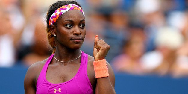 NEW YORK, NY - AUGUST 26: Sloane Stephens of the United States reacts after a point against Mandy Minella of Luxembourg during their first round women's singles match on Day One of the 2013 US Open at USTA Billie Jean King National Tennis Center on August 26, 2013 in the Flushing neighborhood of the Queens borough of New York City. (Photo by Elsa/Getty Images)