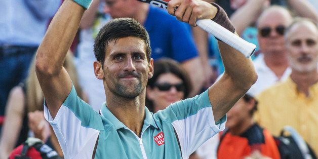Novak Djokovic of Serbia celebrates victory over Richard Gasquet of France during the quarterfinals of the Rogers Cup on August 9, 2013 at Uniprix Stadium in Montreal. AFP PHOTO / ROGERIO BARBOSA (Photo credit should read ROGERIO BARBOSA/AFP/Getty Images)