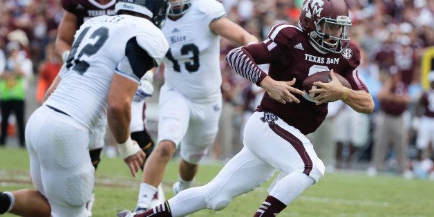 COLLEGE STATION, TX - AUGUST 31: Johnny Manziel #2 of the Texas A&M Aggies runs upfield in the third quarter during the game against the Rice Owls at Kyle Field on August 31, 2013 in College Station, Texas. (Photo by Scott Halleran/Getty Images)