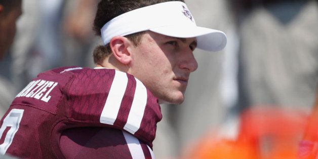 COLLEGE STATION, TX - AUGUST 31: Johnny Manziel #2 of Texas A&M Aggies waits on the bench during the first quarter of the game against the Rice Owls at Kyle Field on August 31, 2013 in College Station, Texas. (Photo by Scott Halleran/Getty Images)