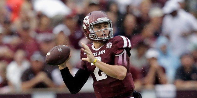 COLLEGE STATION, TX - SEPTEMBER 07: Johnny Manziel #2 of the Texas A&M Aggies during game action against the Sam Houston State Bearkats at Kyle Field on September 7, 2013 in College Station, Texas. (Photo by Bob Levey/Getty Images)