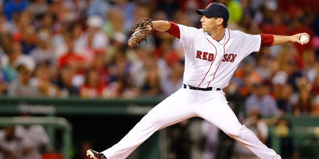 BOSTON, MA - JULY 21: Craig Breslow #32 of the Boston Red Sox pitches against the New York Yankees during the game on July 21, 2013 at Fenway Park in Boston, Massachusetts. (Photo by Jared Wickerham/Getty Images)