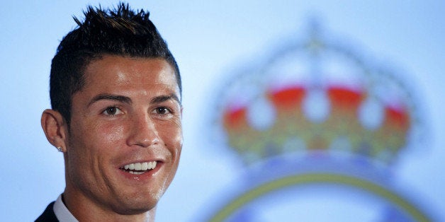 MADRID, SPAIN - SEPTEMBER 15: Cristiano Ronaldo speaks to the media after signing a contract renewal for Real Madrid at Estadio Santiago Bernabeu on September 15, 2013 in Madrid, Spain. (Photo by Gonzalo Arroyo Moreno/Getty Images)