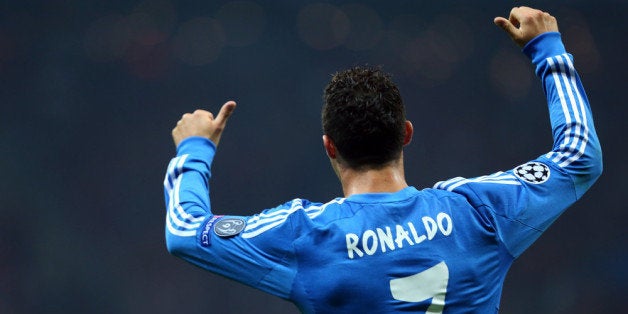 ISTANBUL, TURKEY- SEPTEMBER 17: Christiano Ronaldo of Real Madrid celebrates his goal against Galatasaray during UEFA Champions League Group B match at the Ali Sami Yen Area on September 17, 2013 in Istanbul, Turkey. (Photo by Burak Kara/Getty Images)