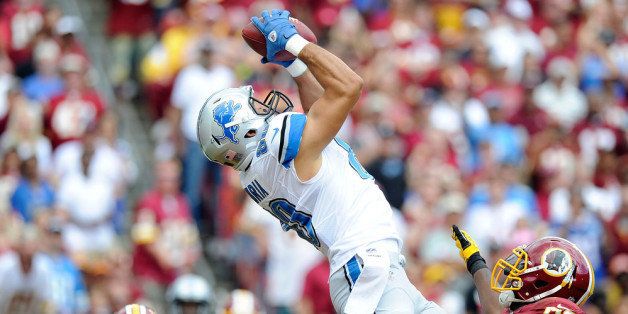 LANDOVER, MD - SEPTEMBER 22: Joseph Fauria #80 of the Detroit Lions scores a touchdown in the second quarter against the Washington Redskins at FedExField on September 22, 2013 in Landover, Maryland. (Photo by Greg Fiume/Getty Images)