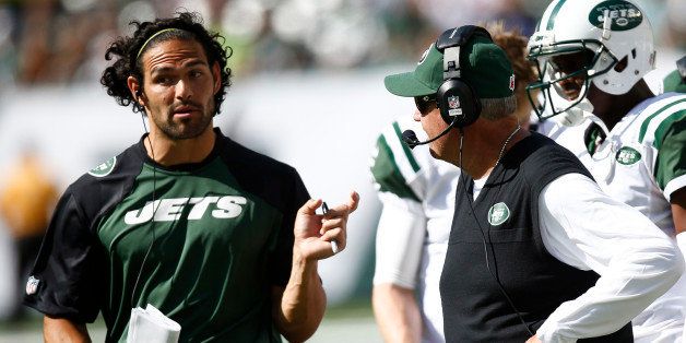EAST RUTHERFORD, NJ - SEPTEMBER 8: Mark Sanchez #6 of the New York Jets talks to head coach Rex Ryan of the New York Jets during the game against the Tampa Bay Buccaneers at MetLife Stadium on September 8, 2013 in East Rutherford, New Jersey. (Photo by Jeff Zelevansky/Getty Images)