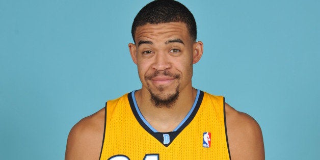 DENVER, CO - SEPTEMBER 30: JaVale McGee #34 of the Denver Nuggets poses for a picture during Media Day on September 30, 2013