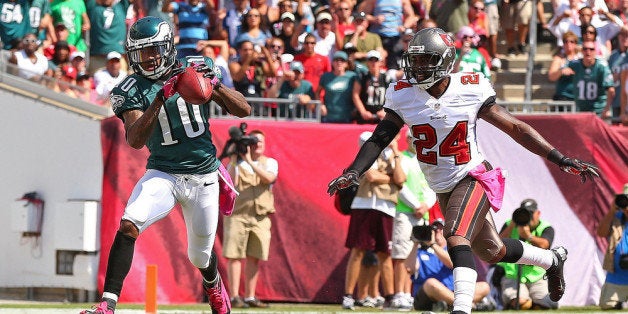 TAMPA, FL - OCTOBER 13: DeSean Jackson #10 of the Philadelphia Eagles catches a touchdown pass over Darrelle Revis #24 of the Tampa Bay Buccaneers during a game at Raymond James Stadium on October 13, 2013 in Tampa, Florida. (Photo by Mike Ehrmann/Getty Images)