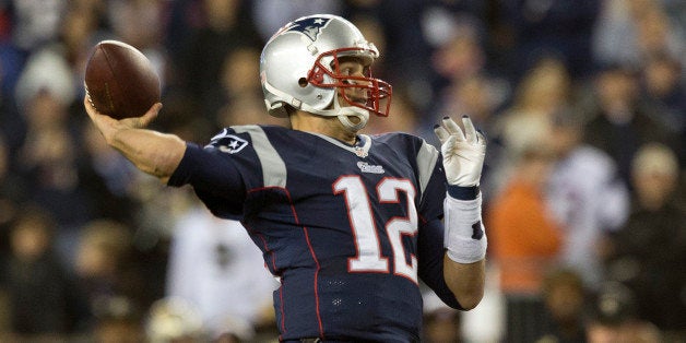 FOXBOROUGH, MA - OCTOBER 13: New England Patriots Tom Brady throws the game-winning 17-yard touchdown pass to Kenbrell Tompkins. The New England Patriots play the New Orleans Saints at Gillette Stadium, Sunday, Oct. 13, 2013. (Photo by Matthew J. Lee/The Boston Globe via Getty Images)