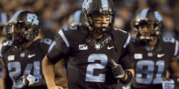 North Carolina quarterback Bryn Renner (2) leads his teammates onto the field against Miami on Thursday, October 10, 2013, at Kenan Stadium in Chapel Hill, North Carolina. (Robert Willett/Raleigh News & Observer/MCT via Getty Images)