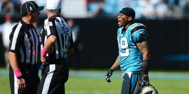 Carolina Panthers wide receiver Steve Smith (89) talks with officials after checking on Panthers quarterback Cam Newton, who was hit by St. Louis Rams defensive end Robert Quinn during third-quarter action at Bank of America Stadium in Charlotte, North Carolina on Sunday, October 20, 2013. Panthers won, 30-15. (Jeff Siner/Charlotte Observer/MCT via Getty Images)