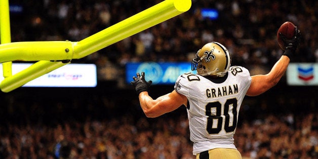 NEW ORLEANS, LA - SEPTEMBER 22: Jimmy Graham #80 of the New Orleans Saints celebrates a touchdown against the Arizona Cardinals during a game at the Mercedes-Benz Superdome on September 22, 2013 in New Orleans, Louisiana. The Saints defeated the Cardinals 31-7. (Photo by Stacy Revere/Getty Images)