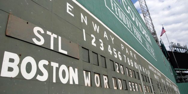 BOSTON - OCTOBER 22: The scoreboard on the Green Monster is seen ahead of the World Series at Fenway Park in Boston, Oct. 22, 2013. (Photo by Jessica Rinaldi for The Boston Globe via Getty Images)