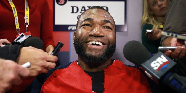 BOSTON - OCTOBER 22: Red Sox designated hitter David Ortiz is all smiles as he takes questions during the media day event. The Boston Red Sox and the St. Louis Cardinals worked out at Fenway Park in preparation for Game One of the World Series. They also had media availability before their on field activities. (Photo by Jim Davis/The Boston Globe via Getty Images)