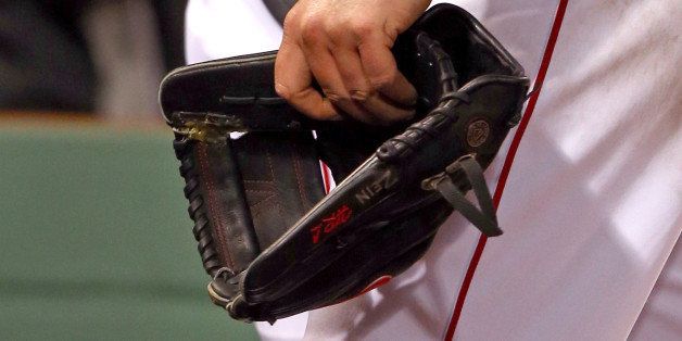 BOSTON, MA - OCTOBER 23: A detailed view of Jon Lester #31 of the Boston Red Sox glove as he leaves the game in the eighth inning against the St. Louis Cardinals during Game One of the 2013 World Series at Fenway Park on October 23, 2013 in Boston, Massachusetts. (Photo by Elsa/Getty Images) 