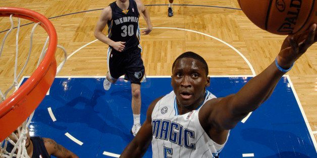 ORLANDO, FL - OCTOBER 18: Victor Oladipo #5 of the Orlando Magic shoots a layup against the Memphis Grizzlies during the game on October 18, 2013 at Amway Center in Orlando, Florida. NOTE TO USER: User expressly acknowledges and agrees that, by downloading and or using this photograph, User is consenting to the terms and conditions of the Getty Images License Agreement. Mandatory Copyright Notice: Copyright 2013 NBAE (Photo by Fernando Medina/NBAE via Getty Images)