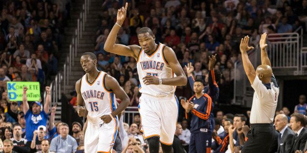 WICHITA, KS - OCTOBER 23: Kevin Durant # 35 of the Oklahoma City Thunder celebrates a three pointer against the Chicago Bulls during the NBA preseason game on October 23, 2013 at the Intrust Bank Arena in Wichita, Kansas. NOTE TO USER: User expressly acknowledges and agrees that, by downloading and or using this photograph, User is consenting to the terms and conditions of the Getty Images License Agreement. Mandatory Copyright Notice: Copyright 2013 NBAE (Photo by Shane Bevel/NBAE via Getty Images)