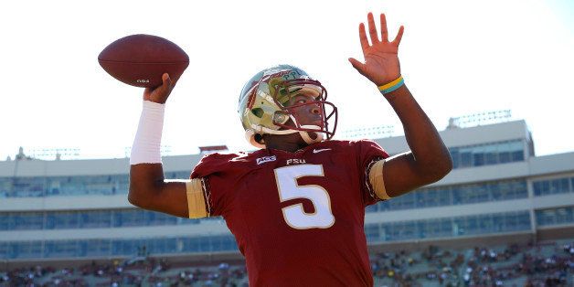 TALLAHASSEE, FL - OCTOBER 26: Quarterback Jameis Winston #5 of the Florida State Seminoles warms up before the game against North Carolina State Wolfpack at Bobby Bowden Field at Doak Campbell Stadium on October 26, 2013 in Tallahassee, Florida. The 3rd ranked Florida State Seminoles defeated North Carolina State Wolfpack 49-17. (Photo by Don Juan Moore/Getty Images)