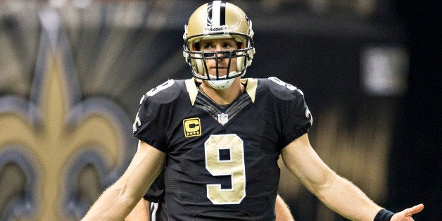 NEW ORLEANS, LA - OCTOBER 27: Drew Brees #9 of the New Orleans Saints reacts to a official call during a game against the Buffalo Bills at Mercedes-Benz Superdome on October 27, 2013 in New Orleans, Louisiana. The Saints defeated the Bills 35-14. (Photo by Wesley Hitt/Getty Images)