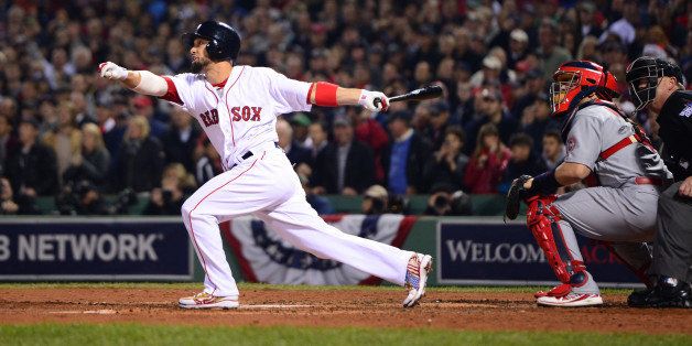 BOSTON, MA - OCTOBER 30: Shane Victorino #18 of the Boston Red Sox hits a three-run triple against the St. Louis Cardinals in the third inning of Game Six of the World Series on October 30, 2013 at Fenway Park in Boston, Massachusetts. (Photo by Michael Ivins/Boston Red Sox/Getty Images)