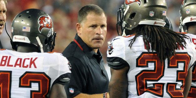 TAMPA, FL - SEPTEMBER 15: Coach Greg Schiano of the Tampa Bay Buccaneers directs play in the 4th quarter against the New Orleans Saints September 15, 2013 at Raymond James Stadium in Tampa, Florida. The Saints won 16 - 14. (Photo by Al Messerschmidt/Getty Images)