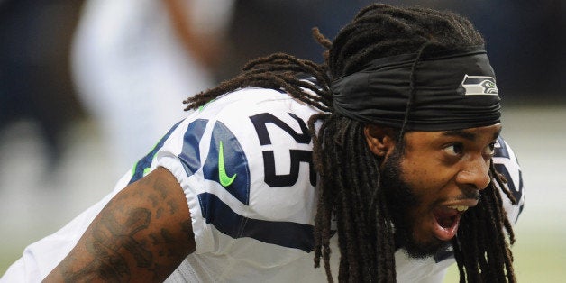 ST. LOUIS, MO - OCTOBER 28: Richard Sherman #25 of the Seattle Seahawks stretches before a game against the St. Louis Rams at