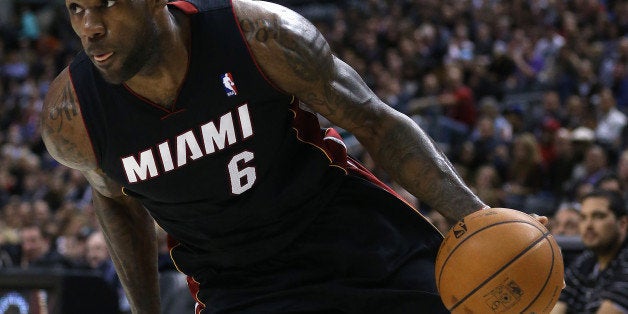 TORONTO, ON- NOVEMBER 5 - LeBron James drives to the hoop as the Toronto Raptors lose to the Miami Heat at Air Canada Centre in Toronto. November 5, 2013. (Steve Russell/Toronto Star via Getty Images)