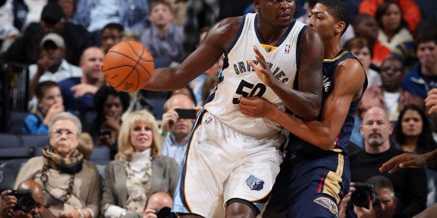 MEMPHIS, TN - NOVEMBER 6: Zach Randolph #50 of the Memphis Grizzlies looks to score against Anthony Davis #23 of the New Orleans Pelicans on November 6, 2013 at FedExForum in Memphis, Tennessee. NOTE TO USER: User expressly acknowledges and agrees that, by downloading and or using this photograph, User is consenting to the terms and conditions of the Getty Images License Agreement. Mandatory Copyright Notice: Copyright 2013 NBAE (Photo by Joe Murphy/NBAE via Getty Images)