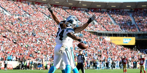 SAN FRANCISCO, CA - NOVEMBER 10: DeAngelo Williams #34 and Nate Chandler #78 of the Carolina Panthers celebrate after Williams scored a touchdown against the San Francisco 49ers during the second quarter at Candlestick Park on November 10, 2013 in San Francisco, California. (Photo by Thearon W. Henderson/Getty Images)