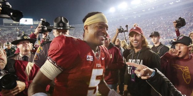 Florida State quarterback Jameis Winston celebrates after a 41-14 victory against Miami at Doak Campbell Stadium in Tallahassee, Florida, on Saturday, November 2, 2013. (Stephen M. Dowell/Orlando Sentinel/MCT via Getty Images)