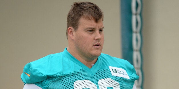DAVIE, FL - JULY 21: Richie Incognito #68 of the Miami Dolphins practices at the Miami Dolphins training facility on July 21