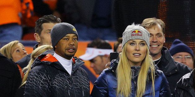 DENVER, CO - NOVEMBER 17: Tiger Woods and Lindsey Vonn attend the game between the Denver Broncos and the Kansas City Chiefs at Sports Authority Field at Mile High on November 17, 2013 in Denver, Colorado. (Photo by Justin Edmonds/Getty Images)