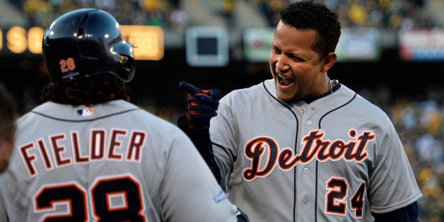 OAKLAND, CA - OCTOBER 10: Miguel Cabrera #24 celebrates his two-run home run with Prince Fielder #28 of the Detroit Tigers i