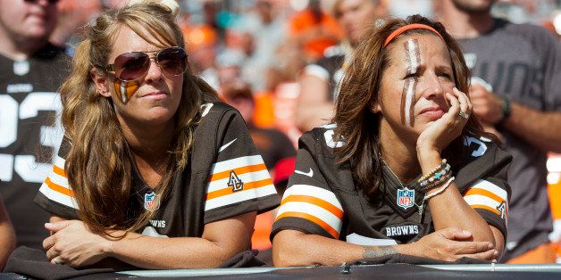 CLEVELAND, OH - SEPTEMBER 8: Cleveland Browns fans watch the final minutes of the game against the Miami Dolphins during the second half at First Energy Stadium on September 8, 2013 in Cleveland, Ohio. The Dolphins defeated the Browns 23-10. (Photo by Jason Miller/Getty Images)