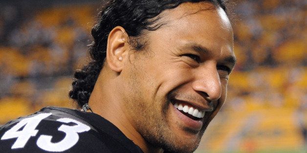 PITTSBURGH, PA - AUGUST 24: Safety Troy Polamalu #43 of the Pittsburgh Steelers smiles as he looks on from the sideline during a preseason game against the Kansas City Chiefs at Heinz Field on August 24, 2013 in Pittsburgh, Pennsylvania. The Chiefs defeated the Steelers 26-20. (Photo by George Gojkovich/Getty Images)
