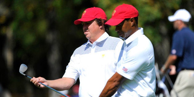 DUBLIN, OH - OCTOBER 01: Jason Dufner and Tiger Woods of the U.S. Team walks the fairway during a practice round prior to th