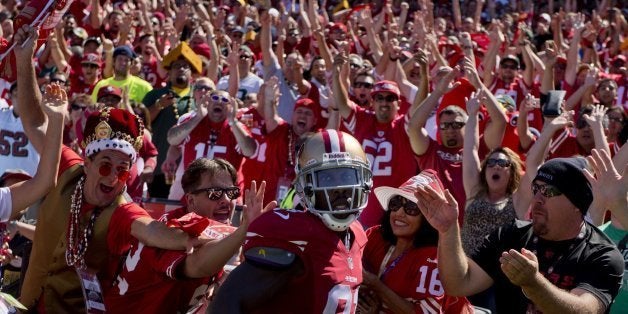 San Francisco 49ers wide receiver Anquan Boldin celebrates with fans after a ten-yard touchdown catch in the second quarter against the Green Bay Packers at Candlestick Park in San Francisco, California, on Sunday, September 8, 2013. (Jose Luis Villegas/Sacramento Bee/MCT via Getty Images)