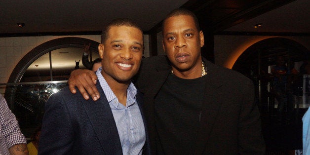 NEW YORK, NY - JUNE 24: (L-R) Robinson Cano and Jay-Z attend The 'Super Heroes' Fundraiser And Domino Tournament at The 40/4