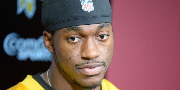 ASHBURN, VA - DECEMBER 11: Washington Redskins quarterback Robert Griffin III (10) during his press conference after practice at Redskins Park on December, 11, 2013 in Ashburn, VA. (Photo by Jonathan Newton / The Washington Post via Getty Images)