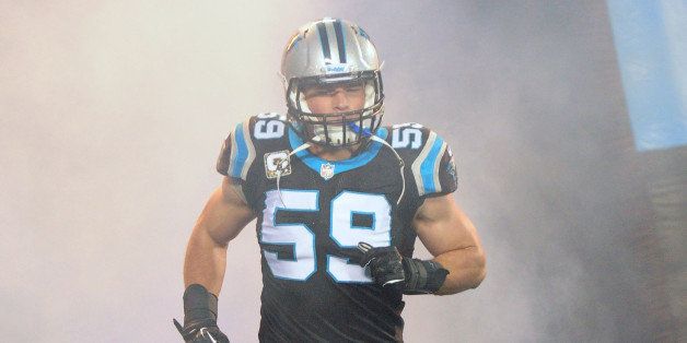 CHARLOTTE, NC - NOVEMBER 18: Luke Kuechly #59 of the Carolina Panthers is introduced before the game against the New England Patriots at Bank of America Stadium on November 18, 2013 in Charlotte, North Carolina. (Photo by Scott Cunningham/Getty Images)