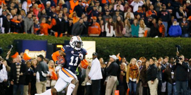 AUBURN, AL - NOVEMBER 30: Chris Davis #11 of the Auburn Tigers returns a missed field goal for the winning touchdown in their 34 to 28 win over the Alabama Crimson Tide at Jordan-Hare Stadium on November 30, 2013 in Auburn, Alabama. (Photo by Kevin C. Cox/Getty Images)