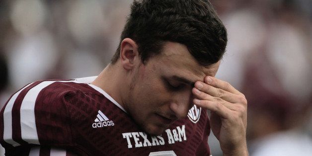 COLLEGE STATION, TX - NOVEMBER 09: Johnny Manziel #2 of the Texas A&M Aggies waits on the field before the game against the Mississippi State Bulldogs at Kyle Field on November 9, 2013 in College Station, Texas. (Photo by Scott Halleran/Getty Images)