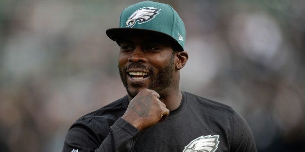 OAKLAND, CA - NOVEMBER 03: Quarterback Michael Vick #7 of the Philadelphia Eagles not in uniform for today's game against the Oakland Raiders, looks on during pre-game warm ups at O.co Coliseum on November 3, 2013 in Oakland, California. (Photo by Thearon W. Henderson/Getty Images)