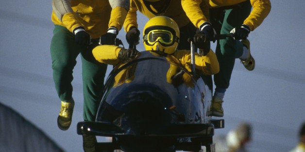 CALGARY - FEBRUARY 25: The Jamaican four man bobsleigh team in action at the 1988 Calgary Winter Olympic Games held on February 25, 1988 in Calgary, Canada. (Photo by David Yarrow/Getty Images)